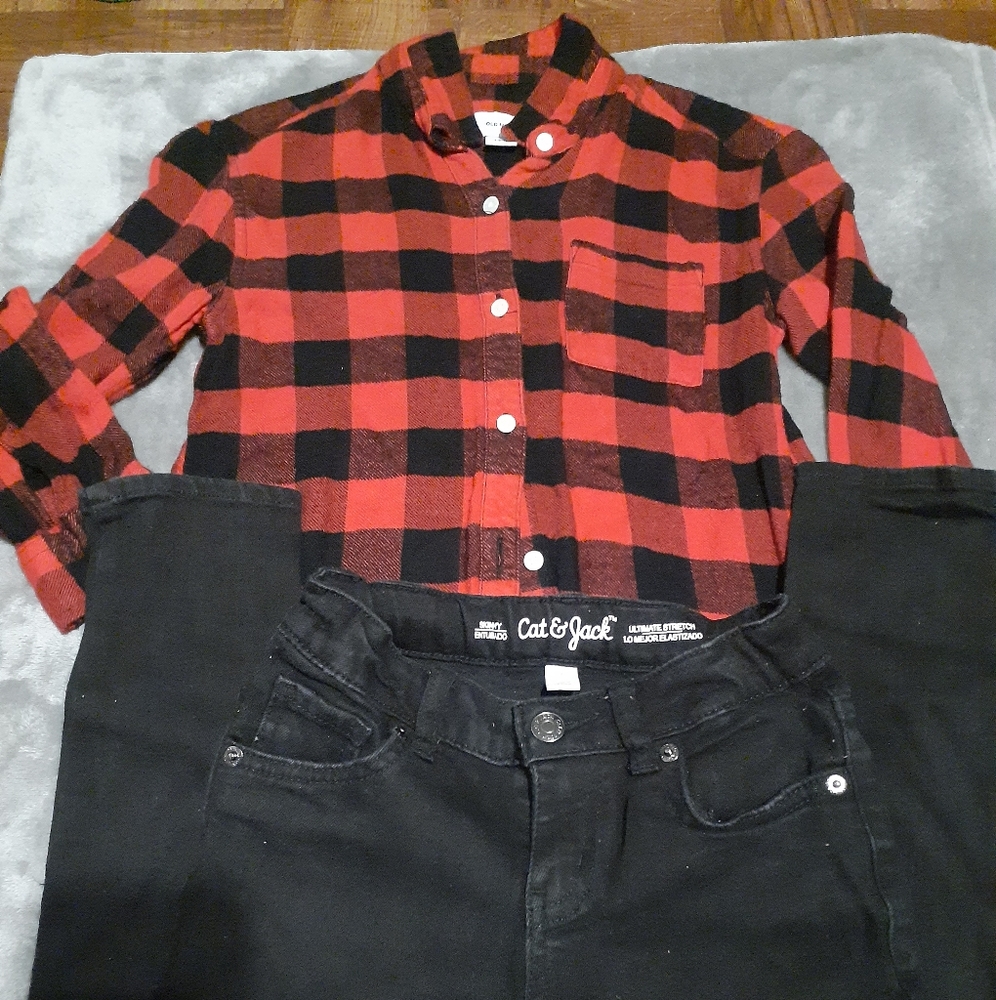 An outfit - checkerboard shirt with black jeans